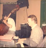 The Master at work. Sadly missed but never forgotten, dear friend and maestro, Munce Angus on electric piano. Picture taken in the downstairs lounge at Dizzy's (now a bank) sometime in the mid 1980s. 